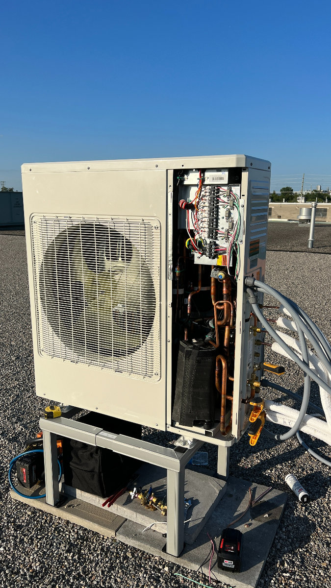 Mini ductless AC unit on commercial building